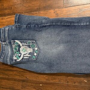 Embroidered Blue Jeans with Green Floral Design